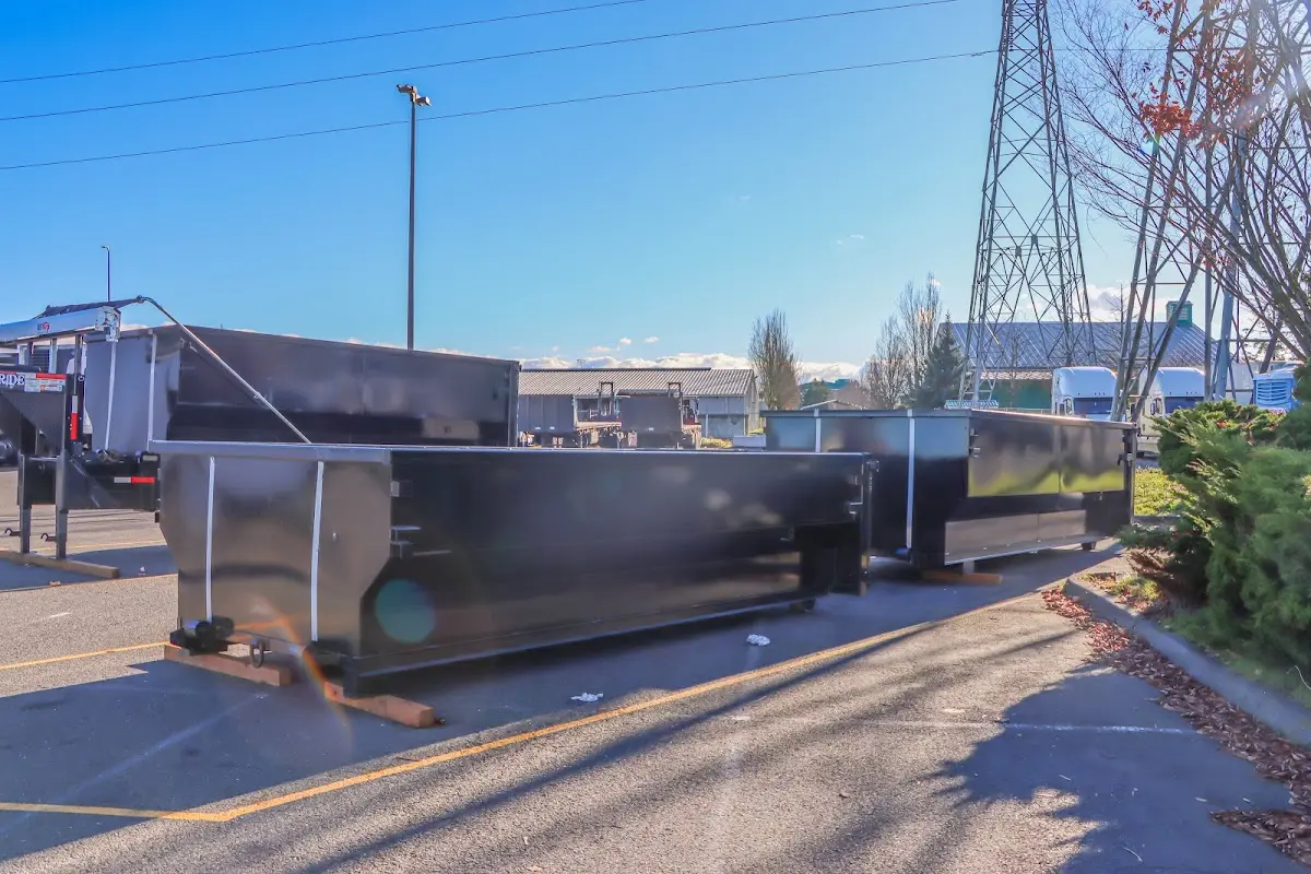 Roll-off dumpster ready for waste disposal at job site for Yard Waste Dumpster Rental in Sandy